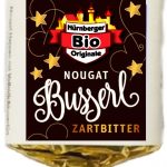 Organic nougat tidbit with bittersweet couverture
