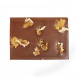 Bio Vollmilchschokolade mit Orangenöl & Walnüssen 50g